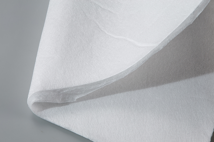 Oil adsorbent nonwoven material